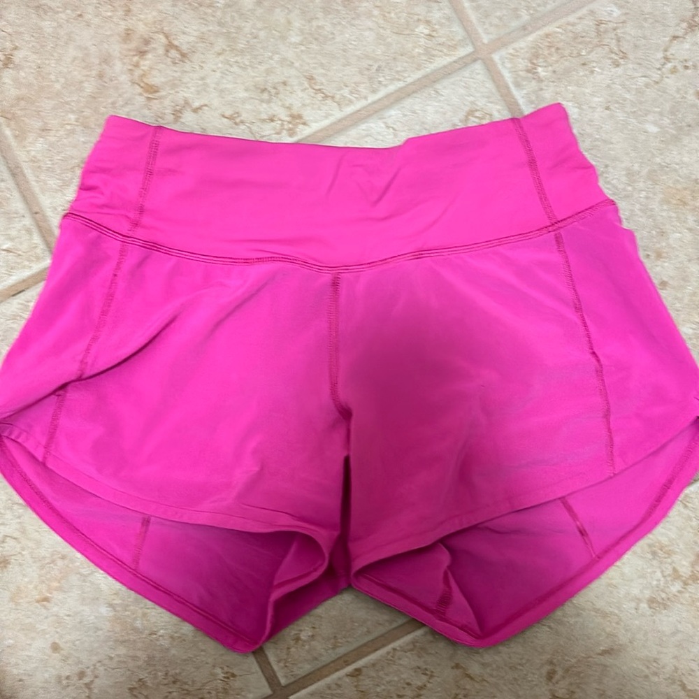 Hot pink lululemon speed up shorts